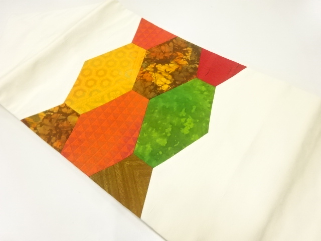 切り嵌め風名物裂名古屋帯